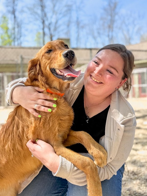 Professional SkyDance staff showing love for pets